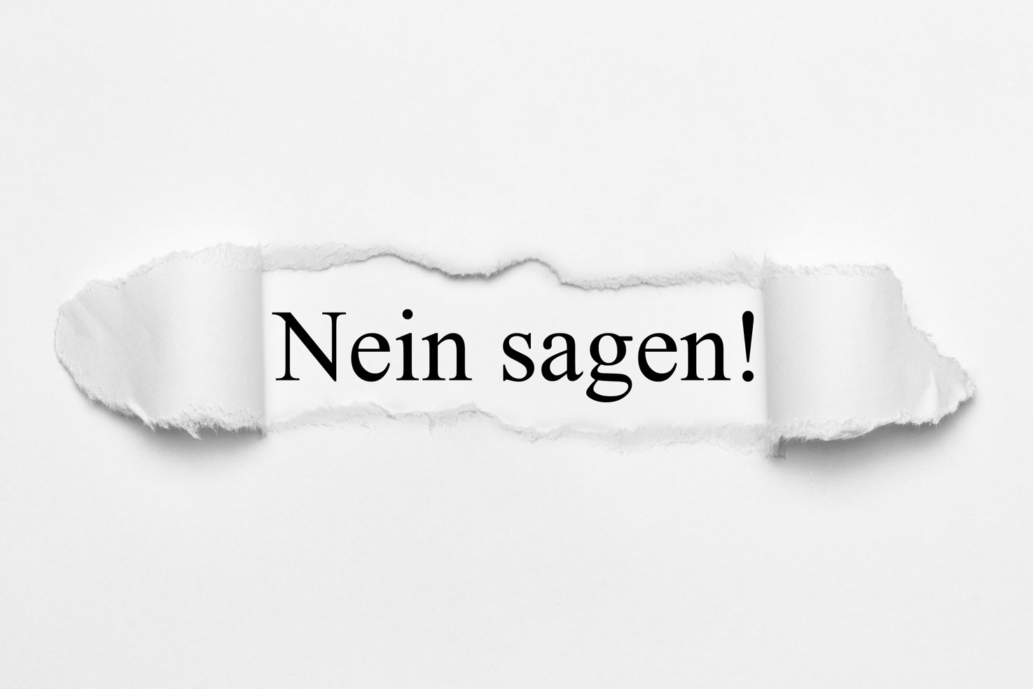 aufgerissenes_papier_mit_text_nein_sagen_und_ausrufungszeichen